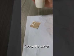 Fiber reinforced water activated kraft paper tape